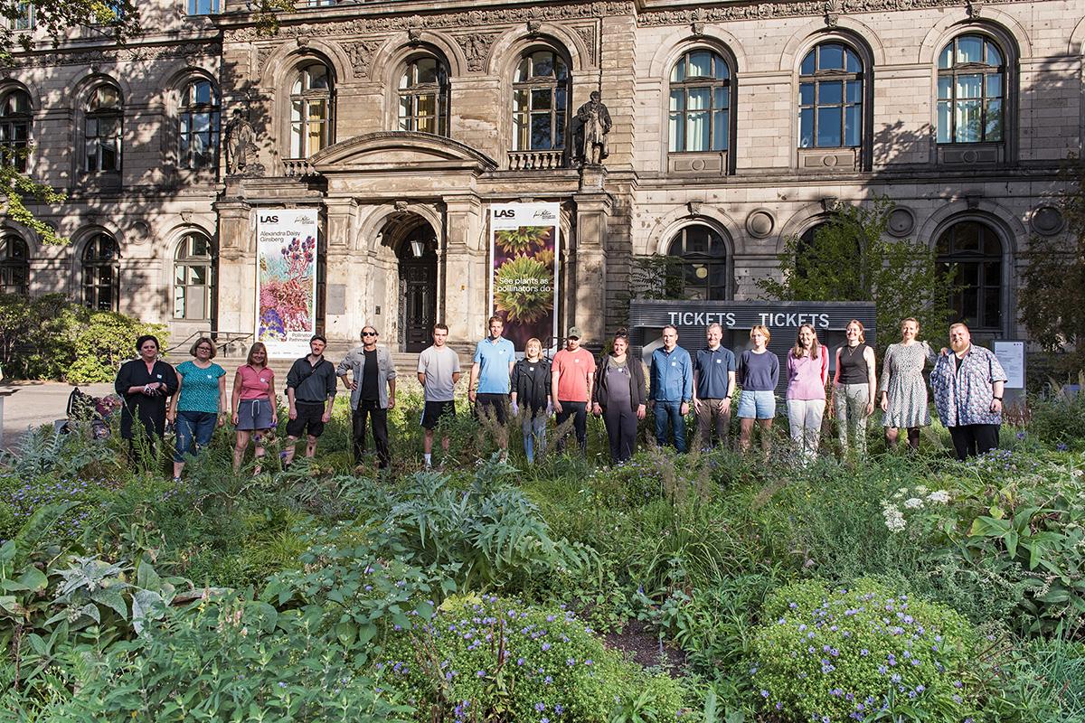 Volunteers working in the front garden and special exhibition called Pollinator-Pathmaker of the of the Museum für Naturkunde Berlin 
