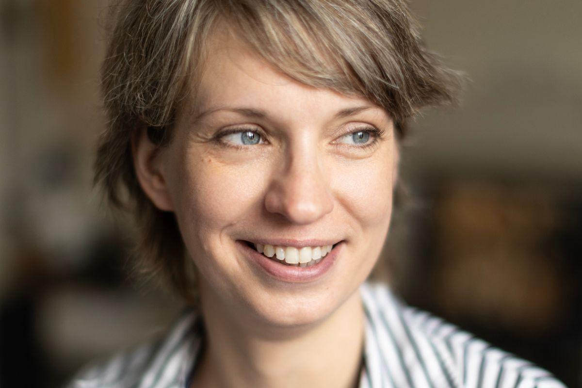 Scientist Jenny Feige smiling at the camera