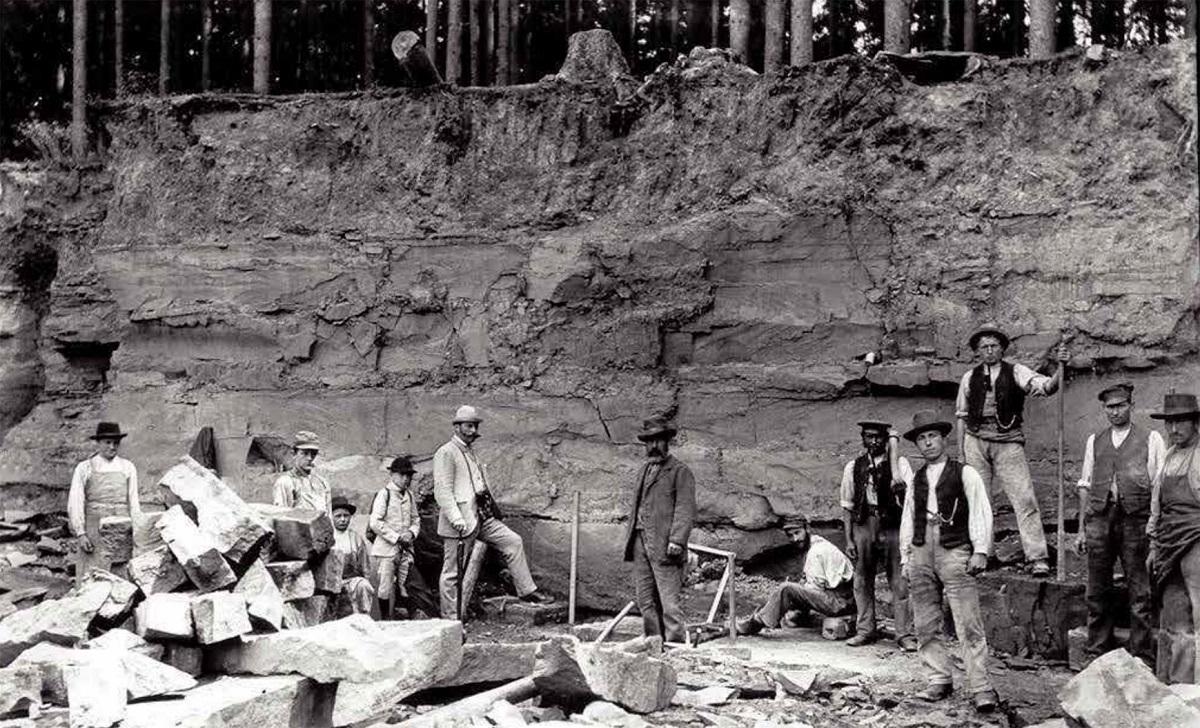 Black-and-white photograph from the late 19th century showing paleontologist Wilhelm Pabst and colleagues in the sandstone quarries at Bromacker. 
