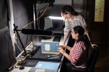 Saskia Brunst with Student assistant at a transcription station 